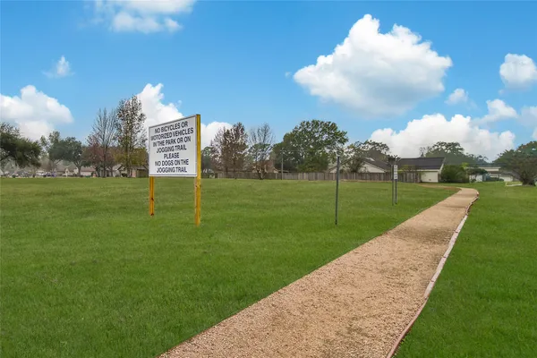 a view of a golf course with a big yard