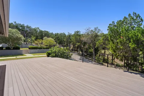 a view of a swimming pool with an outdoor space and seating area