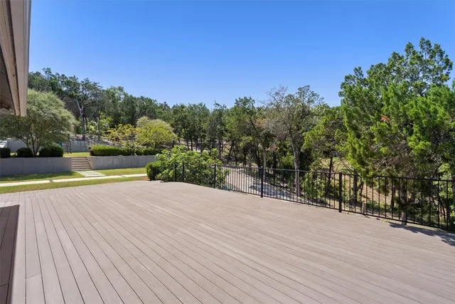 a view of a swimming pool with an outdoor space and seating area