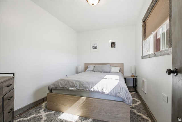 1634 West Arimo Road Arimo, ID 83214 - Photo 37 of 89 Neutral white walls featuring a window with a wood-frame trim