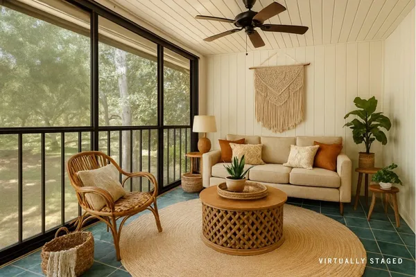 a living room with furniture and a window
