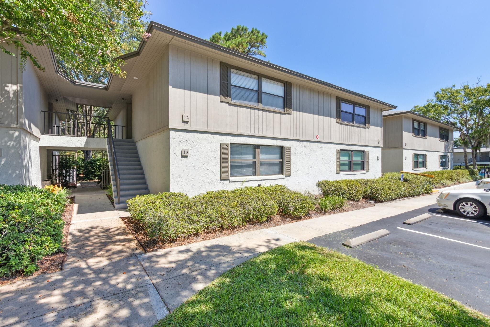16 Alcira Court St. Augustine, FL 32086 - Photo 36 of 61 a front view of a house with a yard and garage