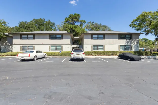 an aerial view of a house with a ocean view