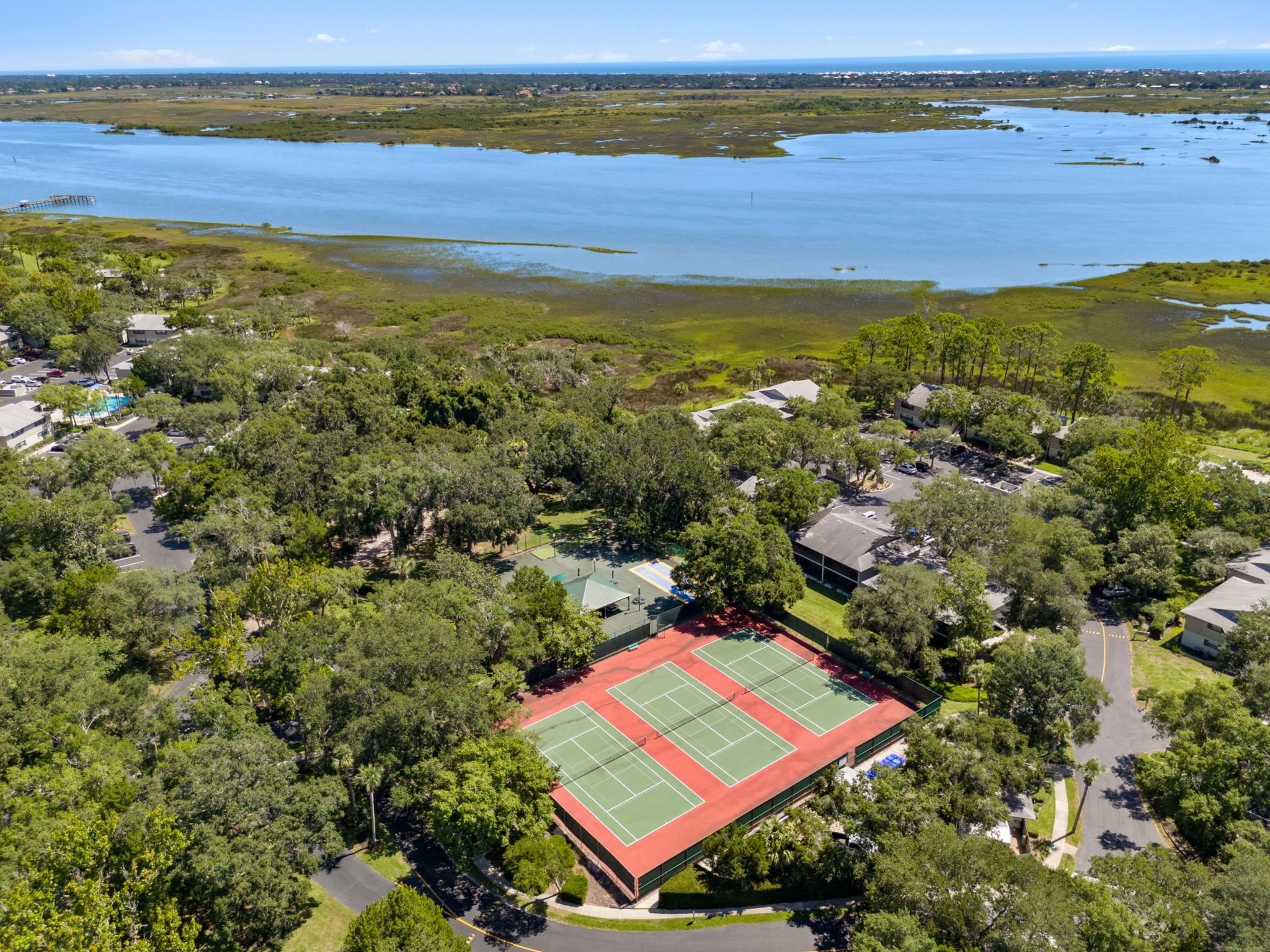 16 Alcira Court St. Augustine, FL 32086 - Photo 43 of 61 an aerial view of residential houses with outdoor space and ocean view
