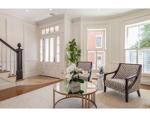 44 Harvard Street Boston, MA 02129 - Photo 4 of 19 a living room with furniture and a window
