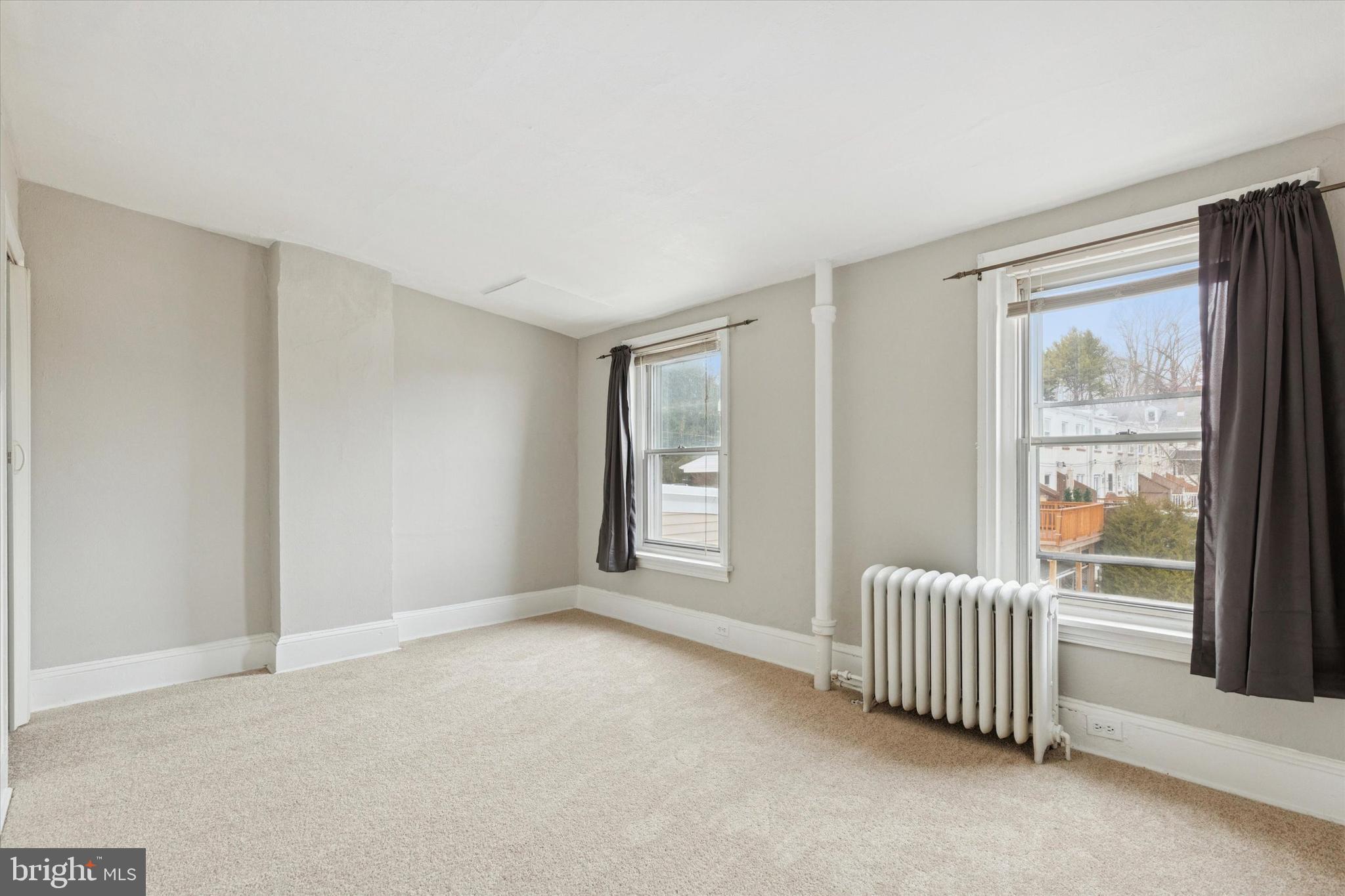 218 Bullock Avenue Conshohocken, PA 19428 - Photo 11 of 16 a view of an empty room with a window