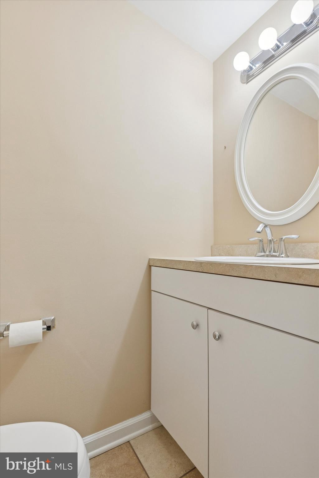 218 Bullock Avenue Conshohocken, PA 19428 - Photo 6 of 16 a bathroom with a toilet a sink and mirror