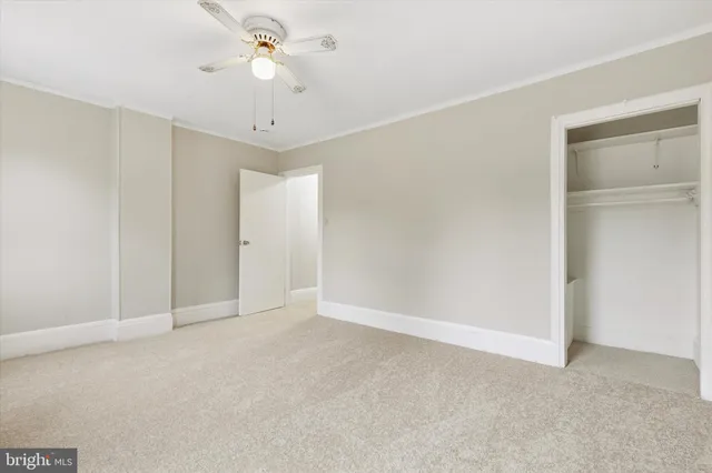 a bathroom with a sink a toilet and vanity