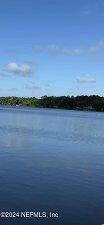 a view of outside space and a lake view
