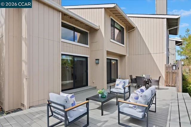 a building outdoor space with patio furniture