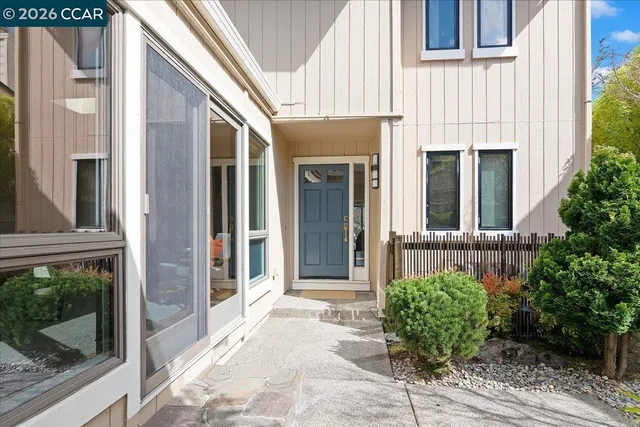 a view of a house with a small porch