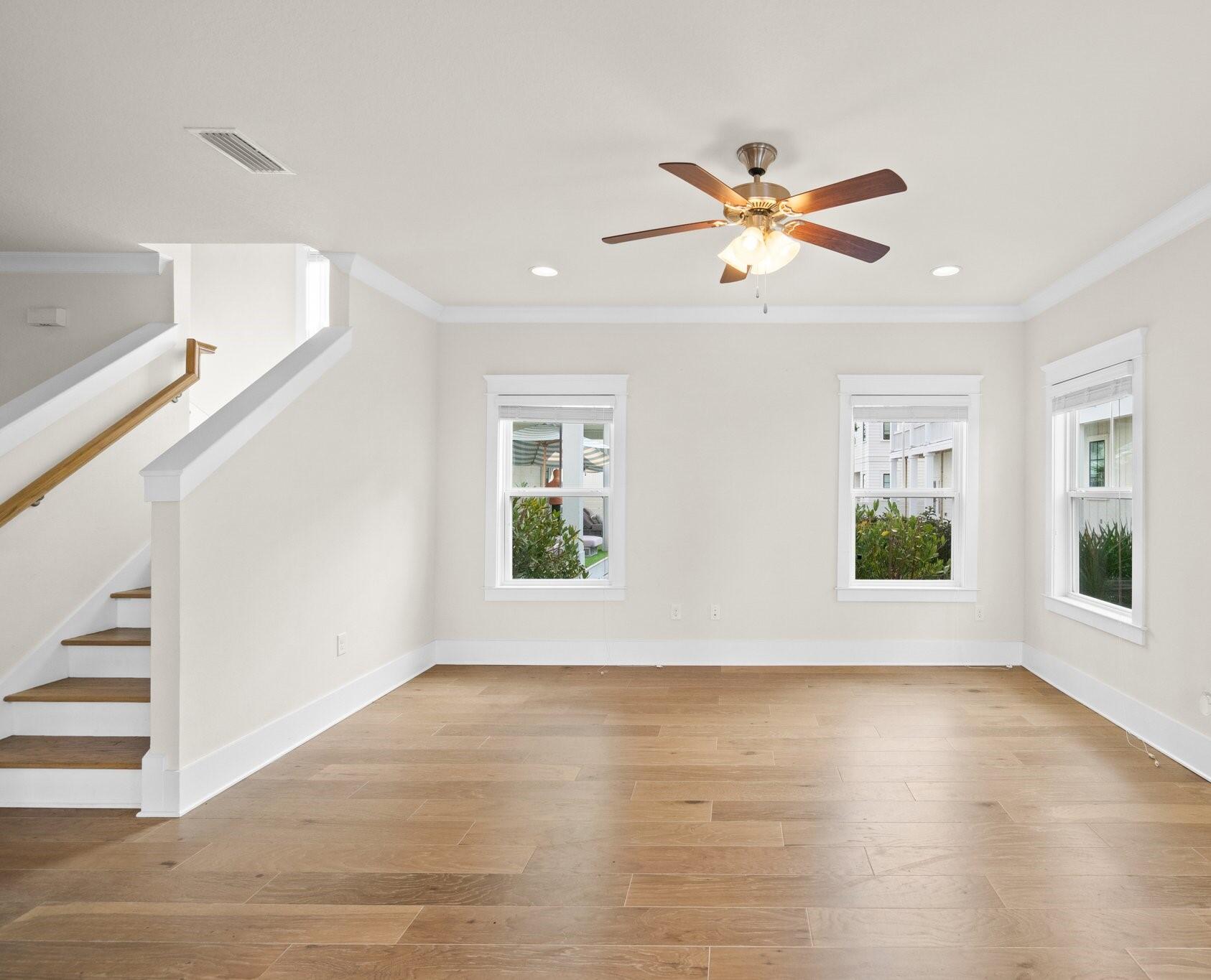 89 Grande Pointe Drive Inlet Beach, FL 32461 - Photo 12 of 47 a view of an empty room with window and wooden floor