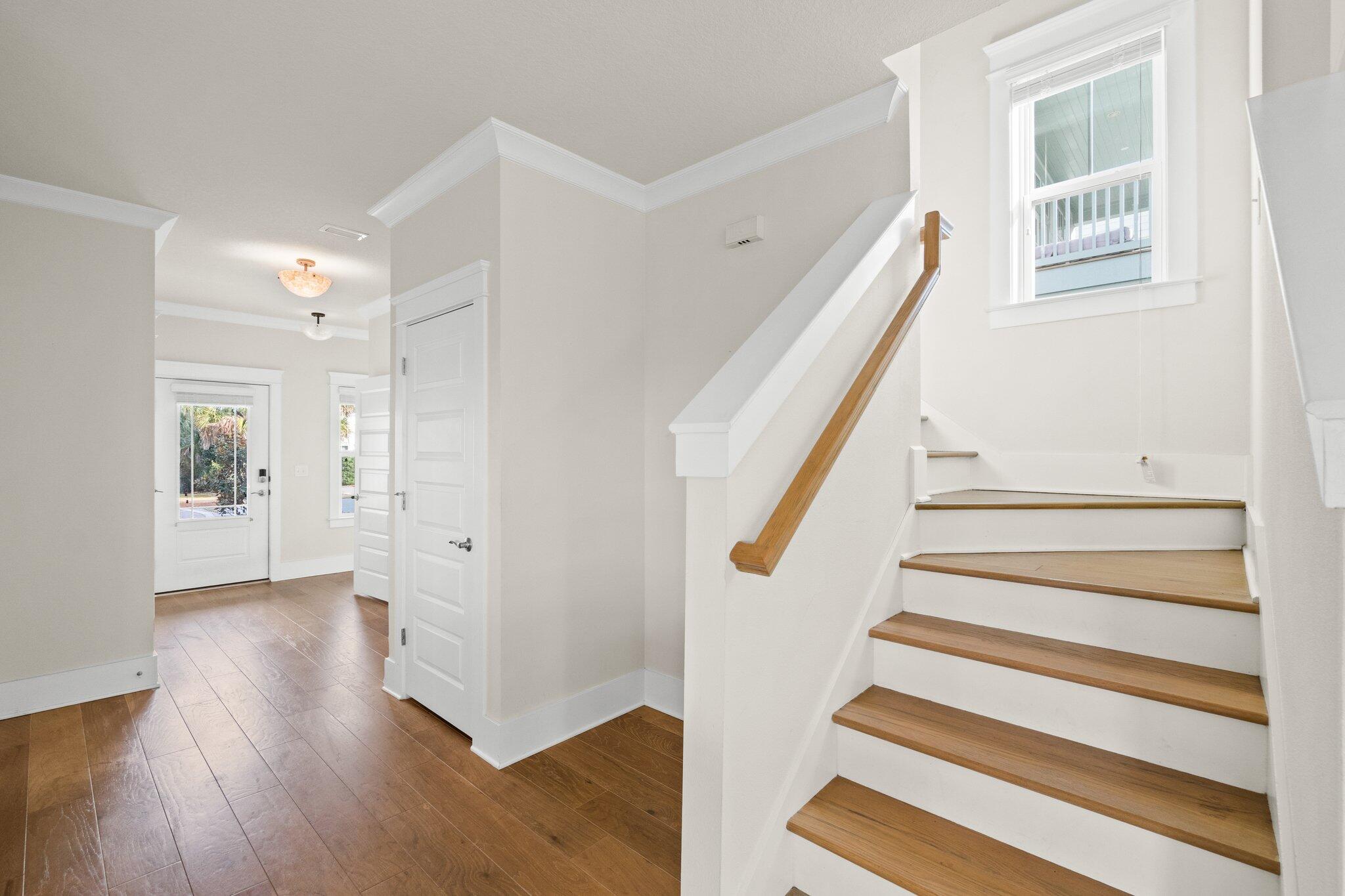 89 Grande Pointe Drive Inlet Beach, FL 32461 - Photo 17 of 47 a view of entryway with wooden floor and stairs