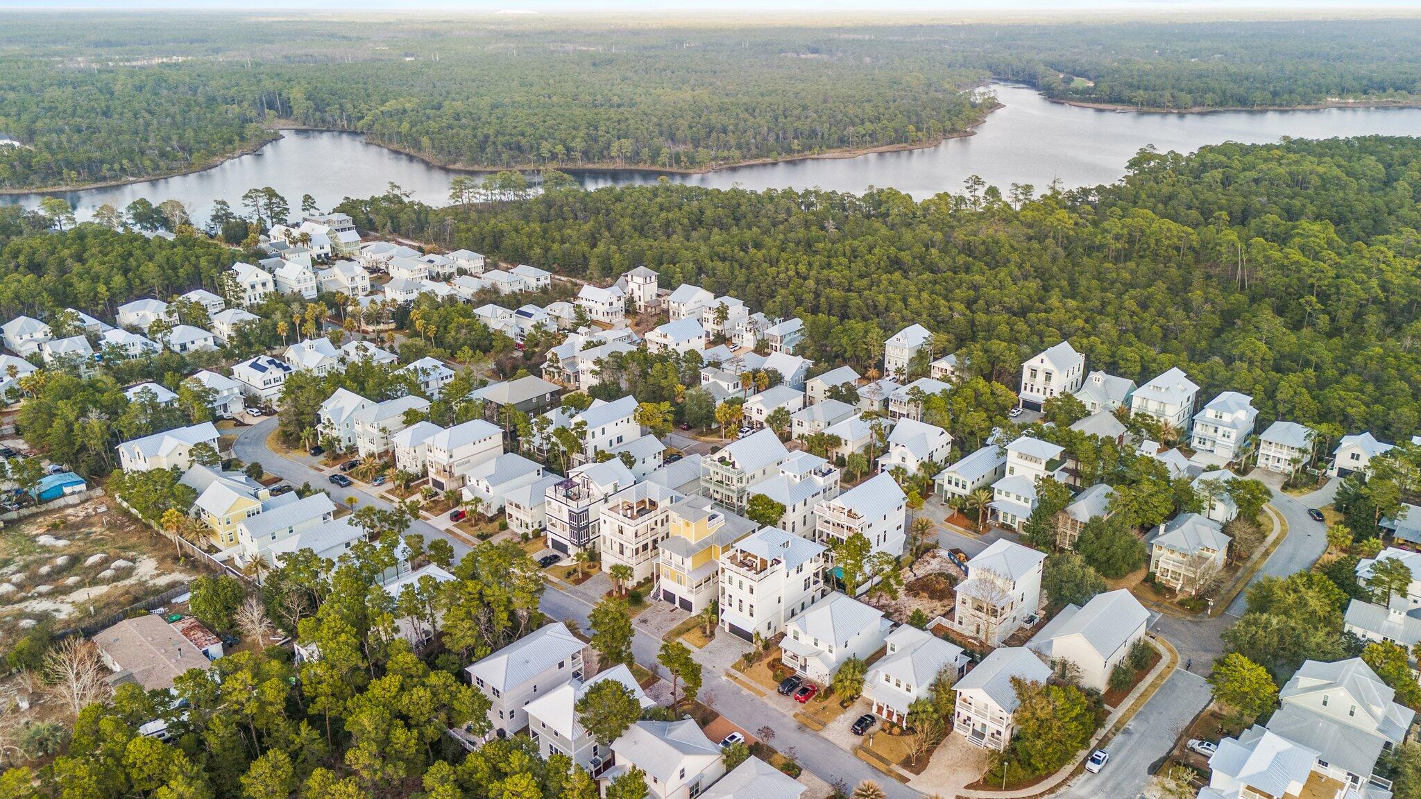89 Grande Pointe Drive Inlet Beach, FL 32461 - Photo 34 of 47 a view of a lake with a city