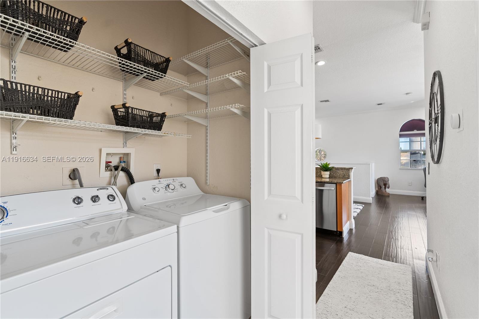 5850 Hampton Hills Boulevard, Unit 5850 Tamarac, FL 33321 - Photo 12 of 22 a utility room with dryer and washer