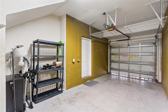 a front view of a multi story residential apartment building with entryway