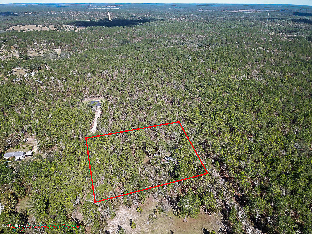 7966 Ranchette Road Melrose, FL 32666 - Photo 3 of 7 a view of a field