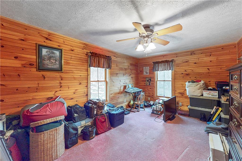 181 Rea Road Avella, PA 15312 - Photo 18 of 22 a living room with furniture a flat screen tv and a window