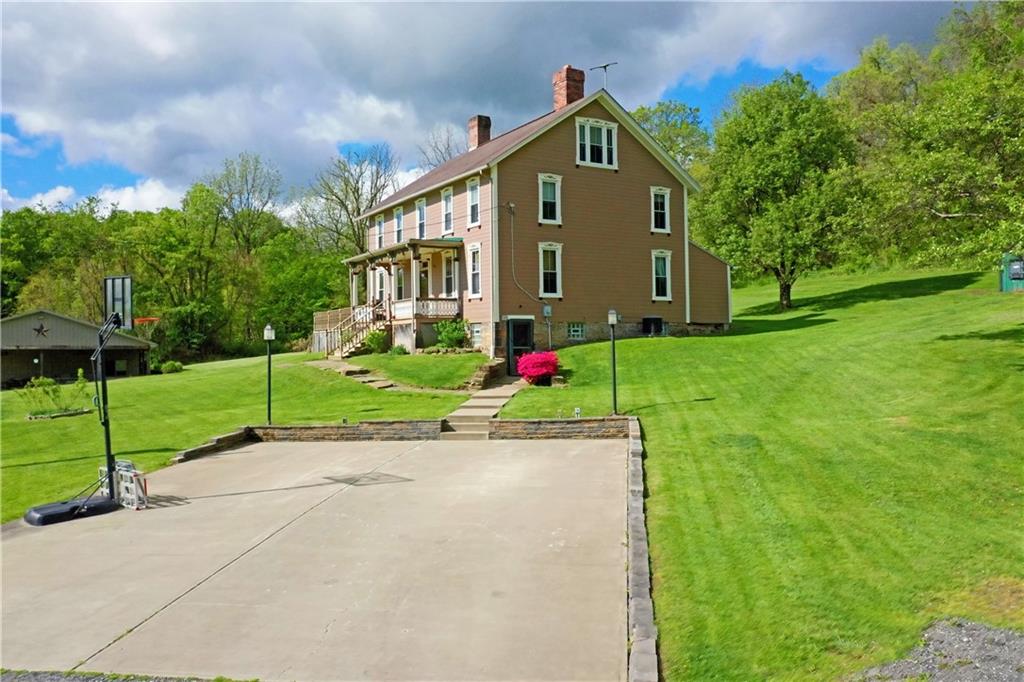 181 Rea Road Avella, PA 15312 - Photo 4 of 22 a front view of a house with entertaining space