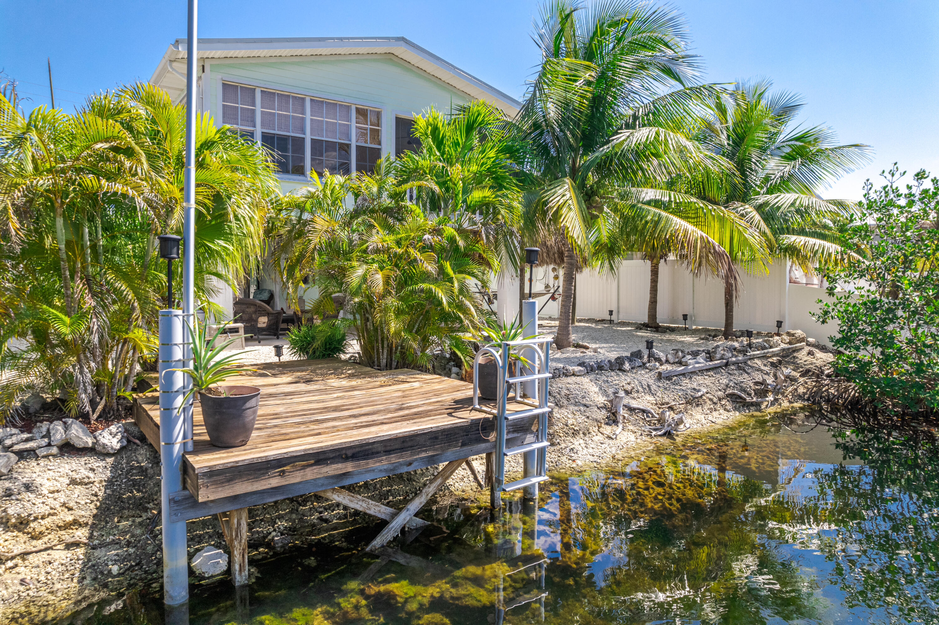 52 Lobstertail Road Big Pine Key, FL 33043 - Photo 17 of 26 Backyard and Dock