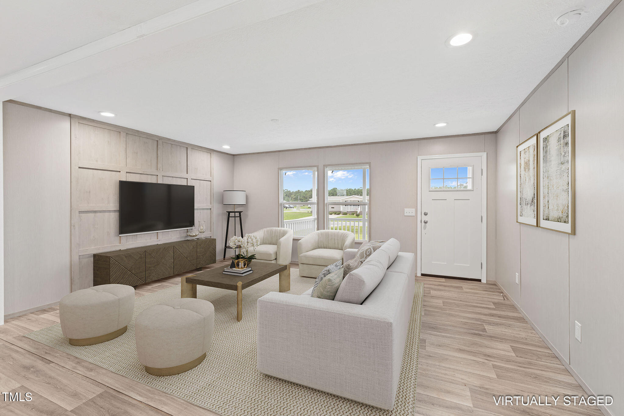 17 Stardust Lane Selma, NC 27576 - Photo 12 of 27 a living room with furniture and a flat screen tv