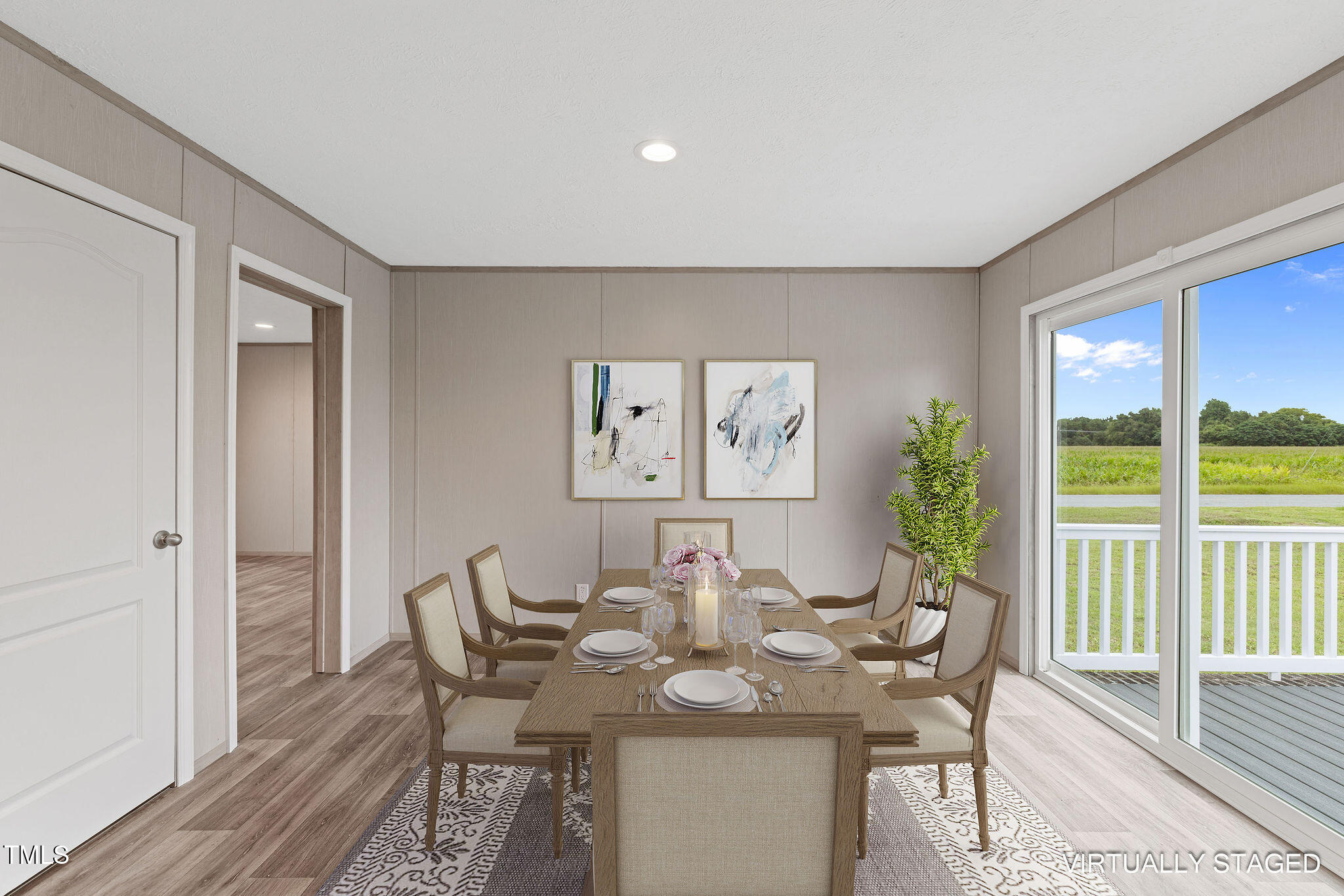 17 Stardust Lane Selma, NC 27576 - Photo 17 of 27 a view of a dining room with furniture and wooden floor