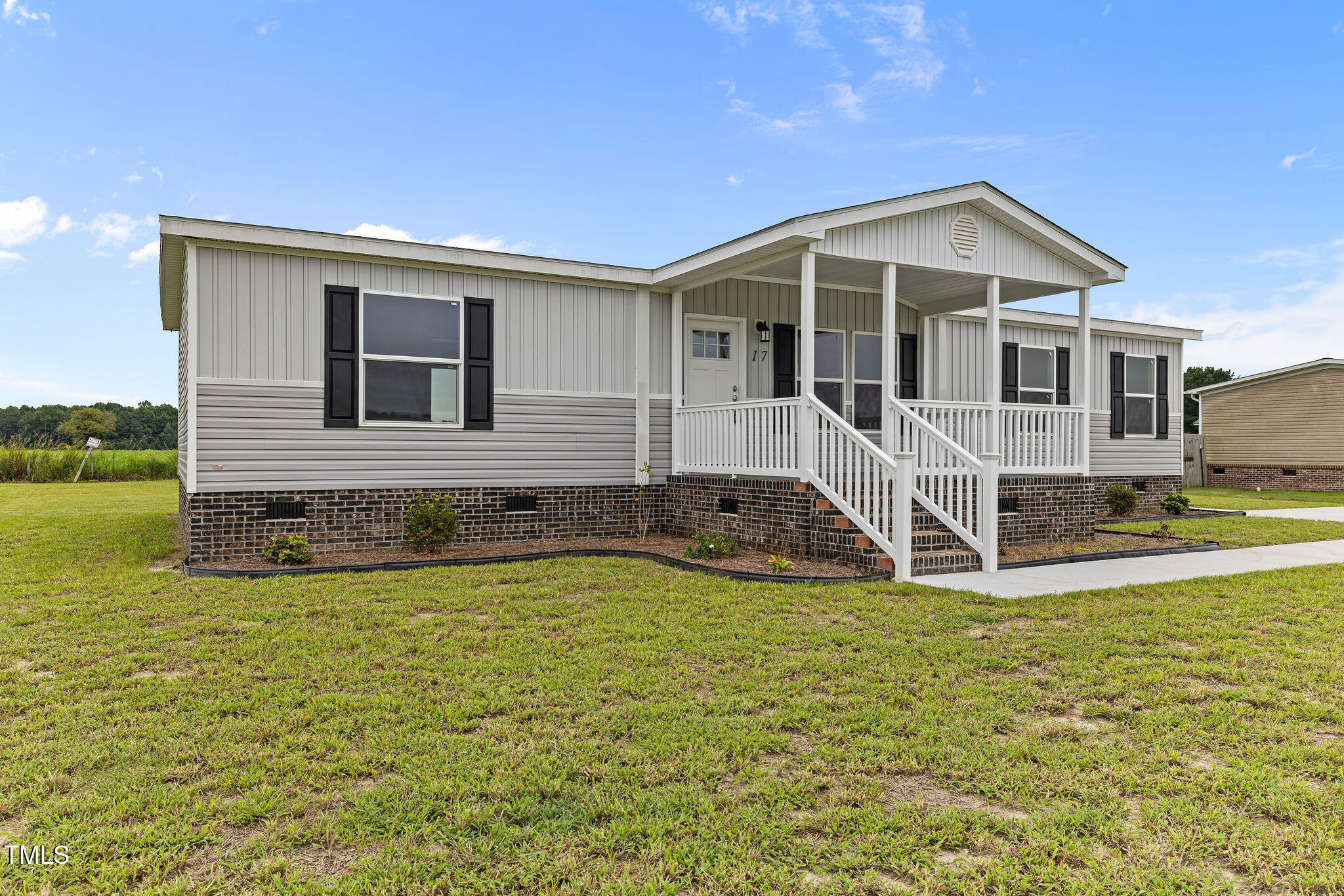 17 Stardust Lane Selma, NC 27576 - Photo 2 of 27 front view of a house with a yard