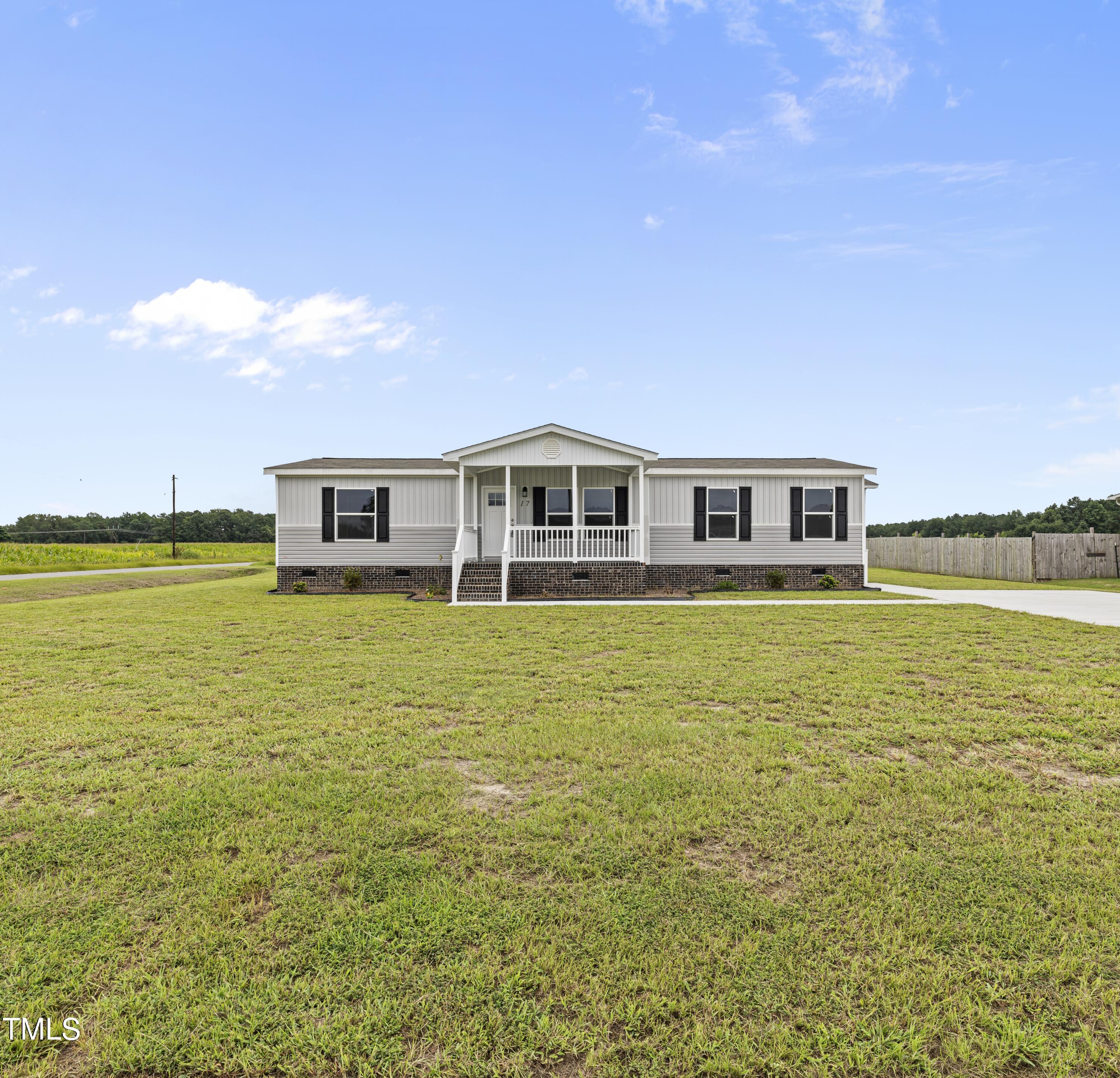 17 Stardust Lane Selma, NC 27576 - Photo 5 of 27 a view of a big room with an ocean view