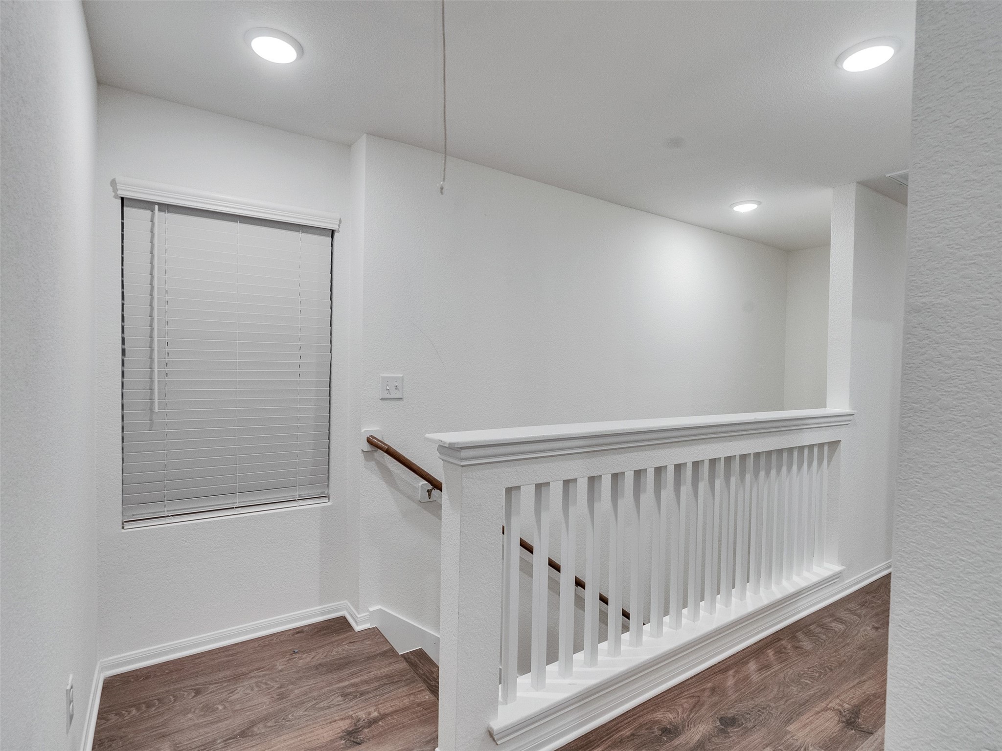 420 Magnolia Lane Richwood, TX 77531 - Photo 17 of 27 a view of staircase with wooden floor and white walls