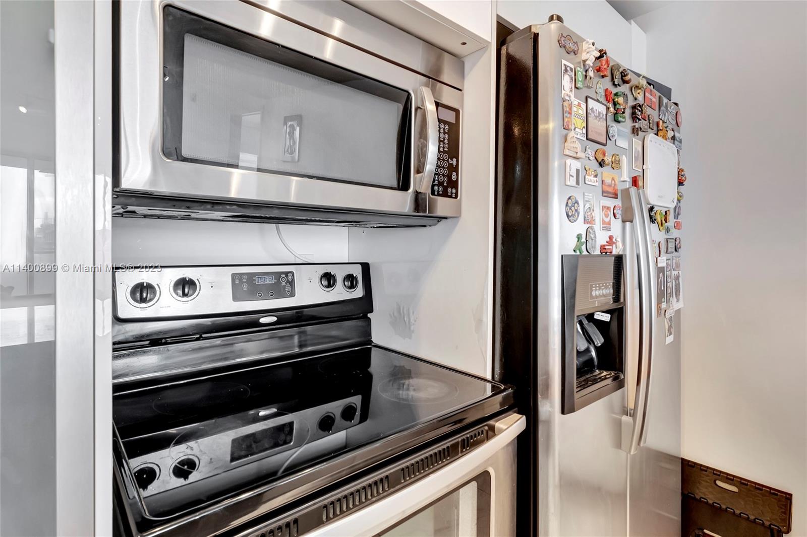 185 Southwest 7th Street, Unit 901 Miami, FL 33130 - Photo 11 of 35 a view of kitchen with stainless steel appliances cabinets and a counter top space