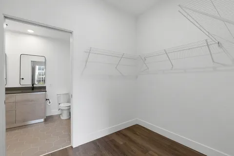 a view of a brick building from a balcony