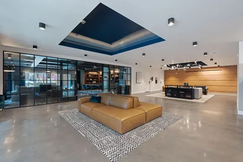 a view of a chairs and table in the patio