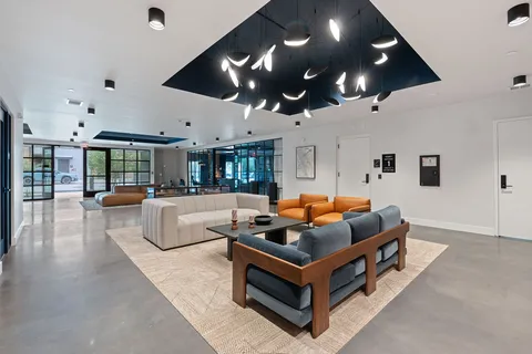 a view of a building with sitting area