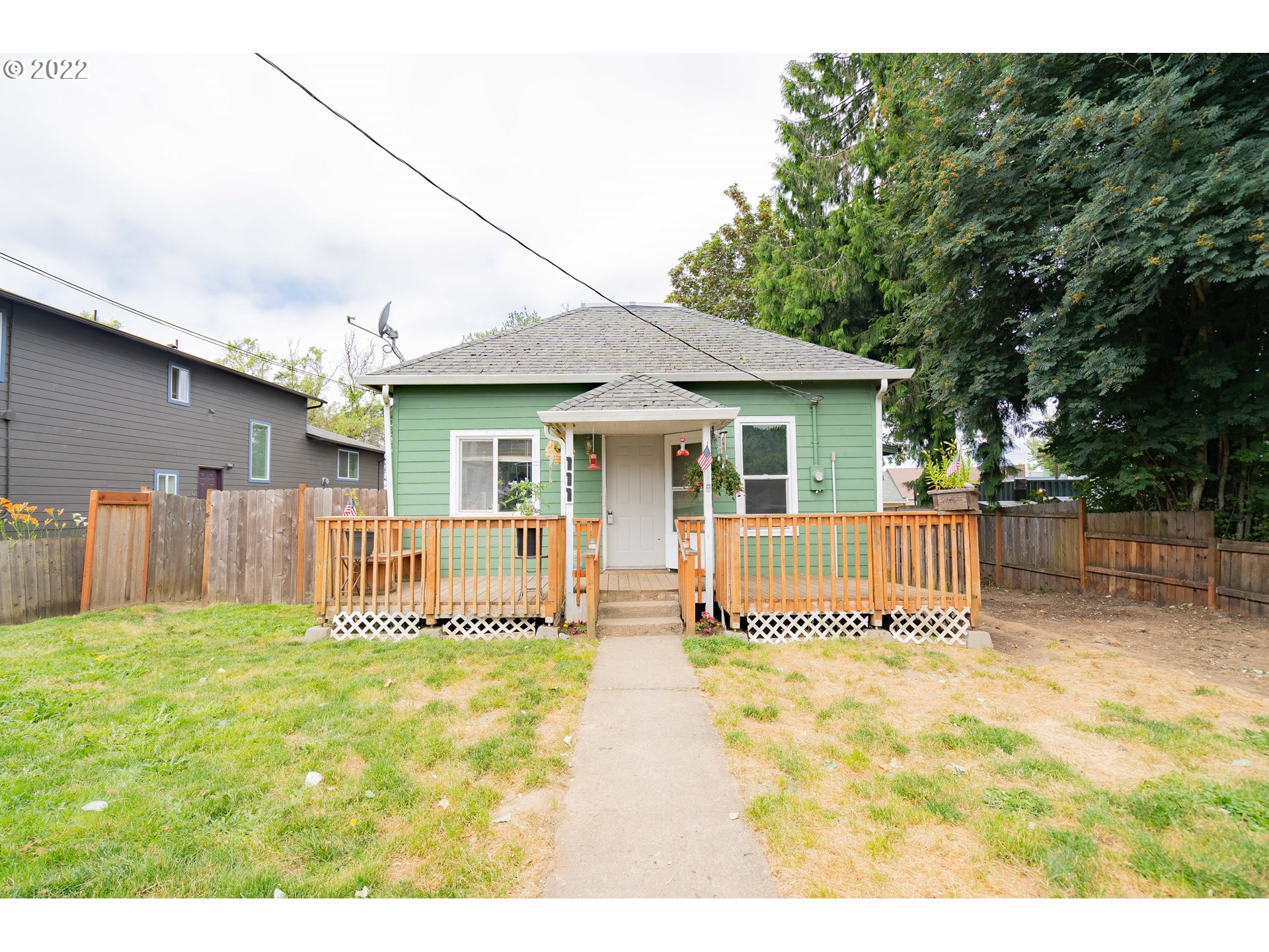 a front view of a house with a patio