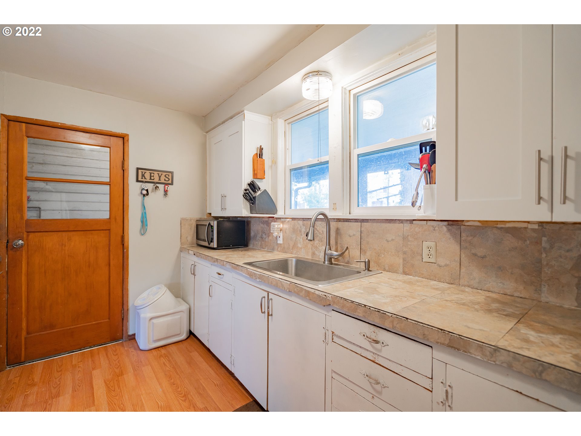 111 South 3rd Avenue Ridgefield, WA 98642 - Photo 15 of 32 a bathroom with a sink and a mirror