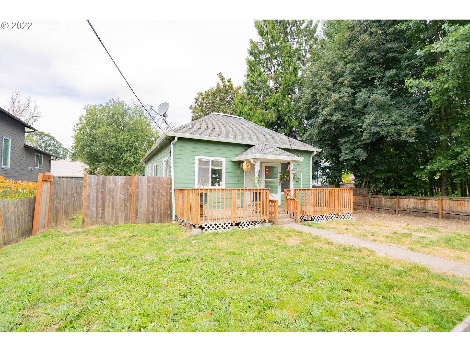 111 South 3rd Avenue Ridgefield, WA 98642 - Photo 2 of 32 a view of a house with a yard and sitting area