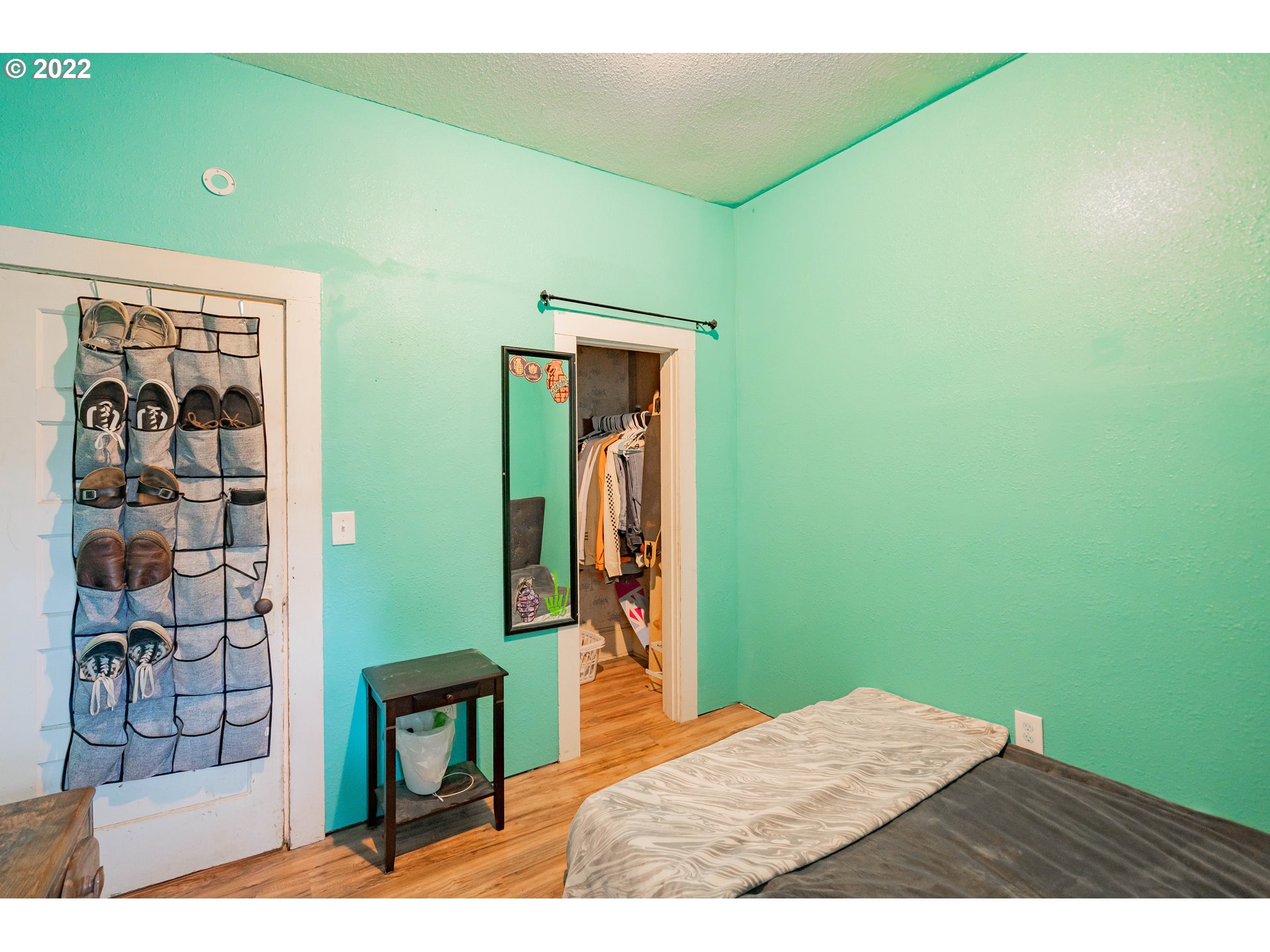 111 South 3rd Avenue Ridgefield, WA 98642 - Photo 25 of 32 a bedroom with a bed and a dresser