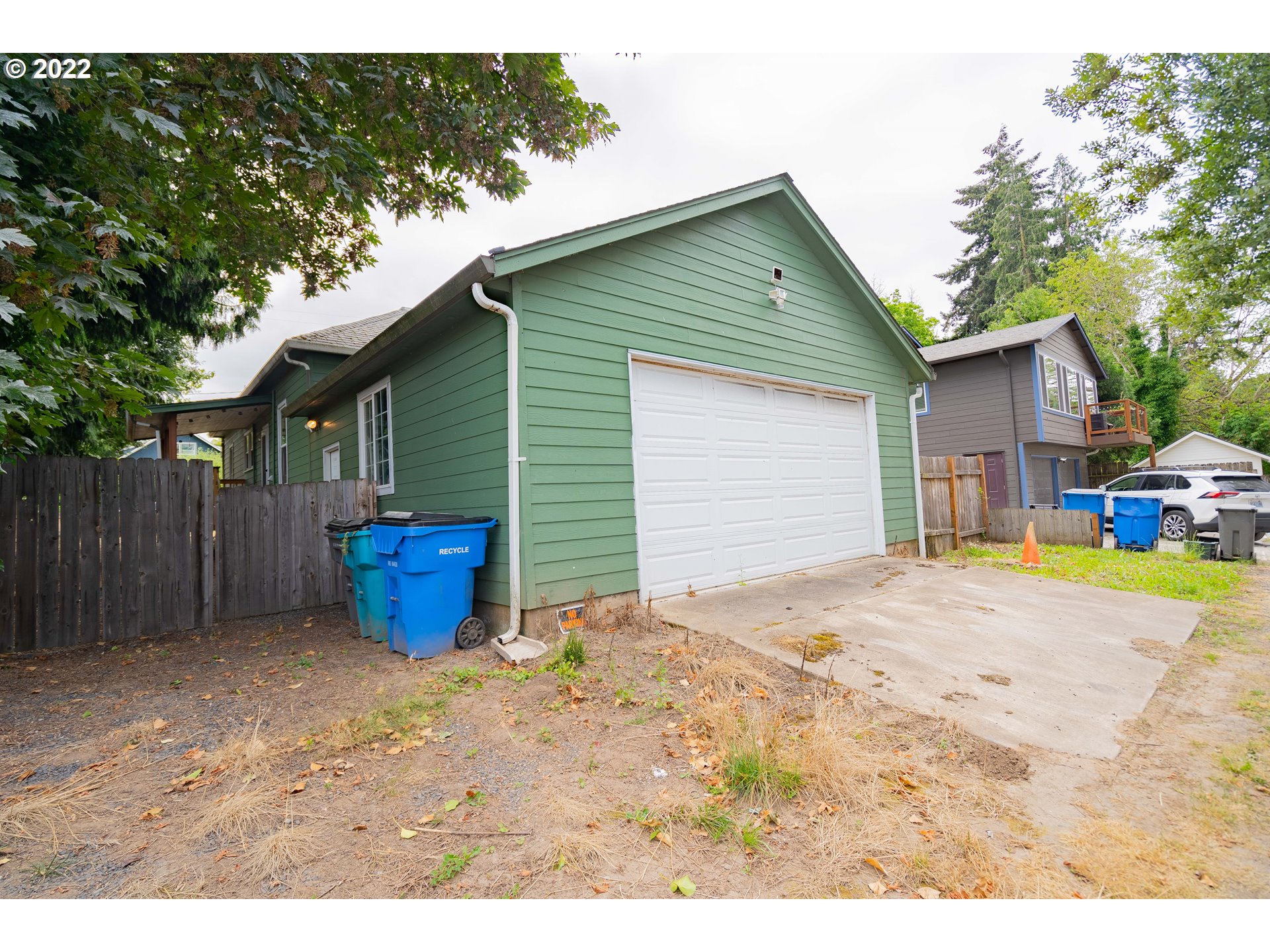 111 South 3rd Avenue Ridgefield, WA 98642 - Photo 29 of 32 a view of a house with backyard and trees