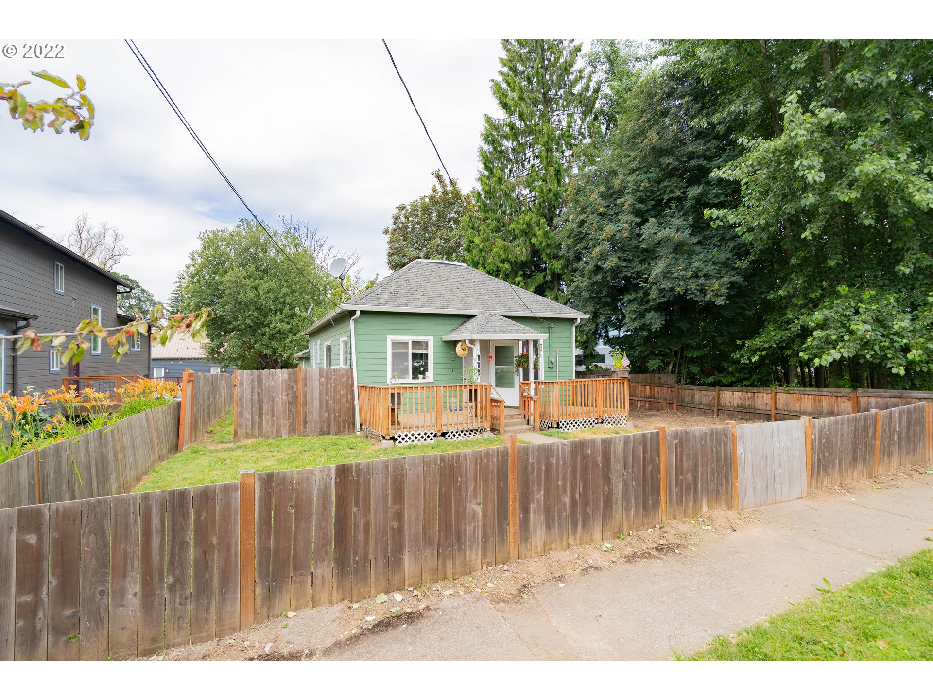 111 South 3rd Avenue Ridgefield, WA 98642 - Photo 3 of 32 a house view with a garden space