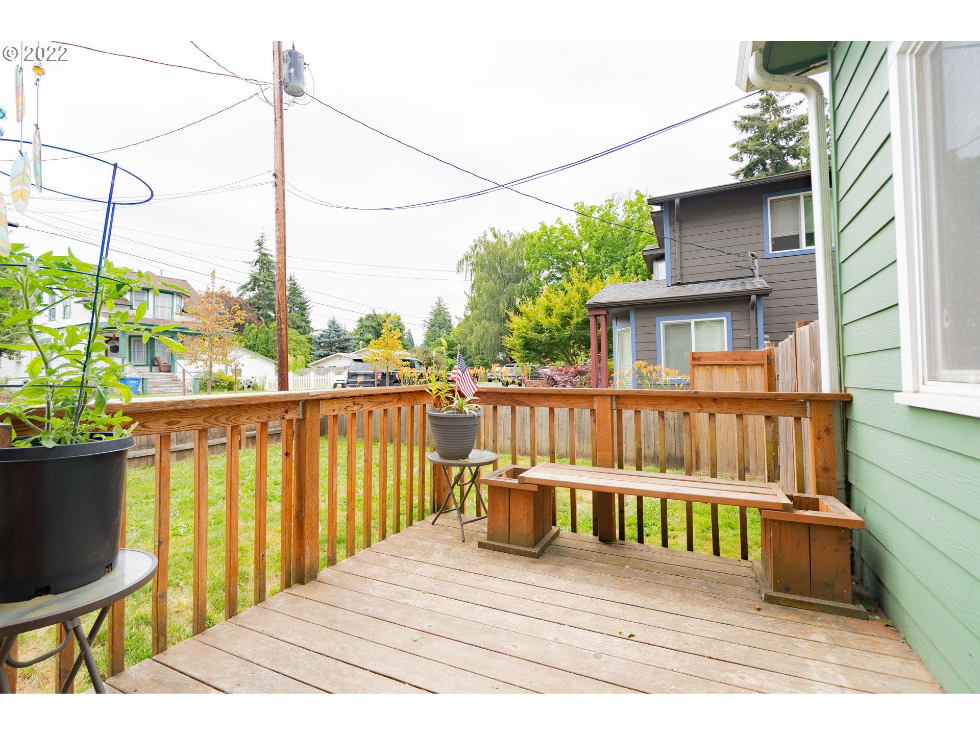111 South 3rd Avenue Ridgefield, WA 98642 - Photo 5 of 32 a view of a wooden chairs on the deck