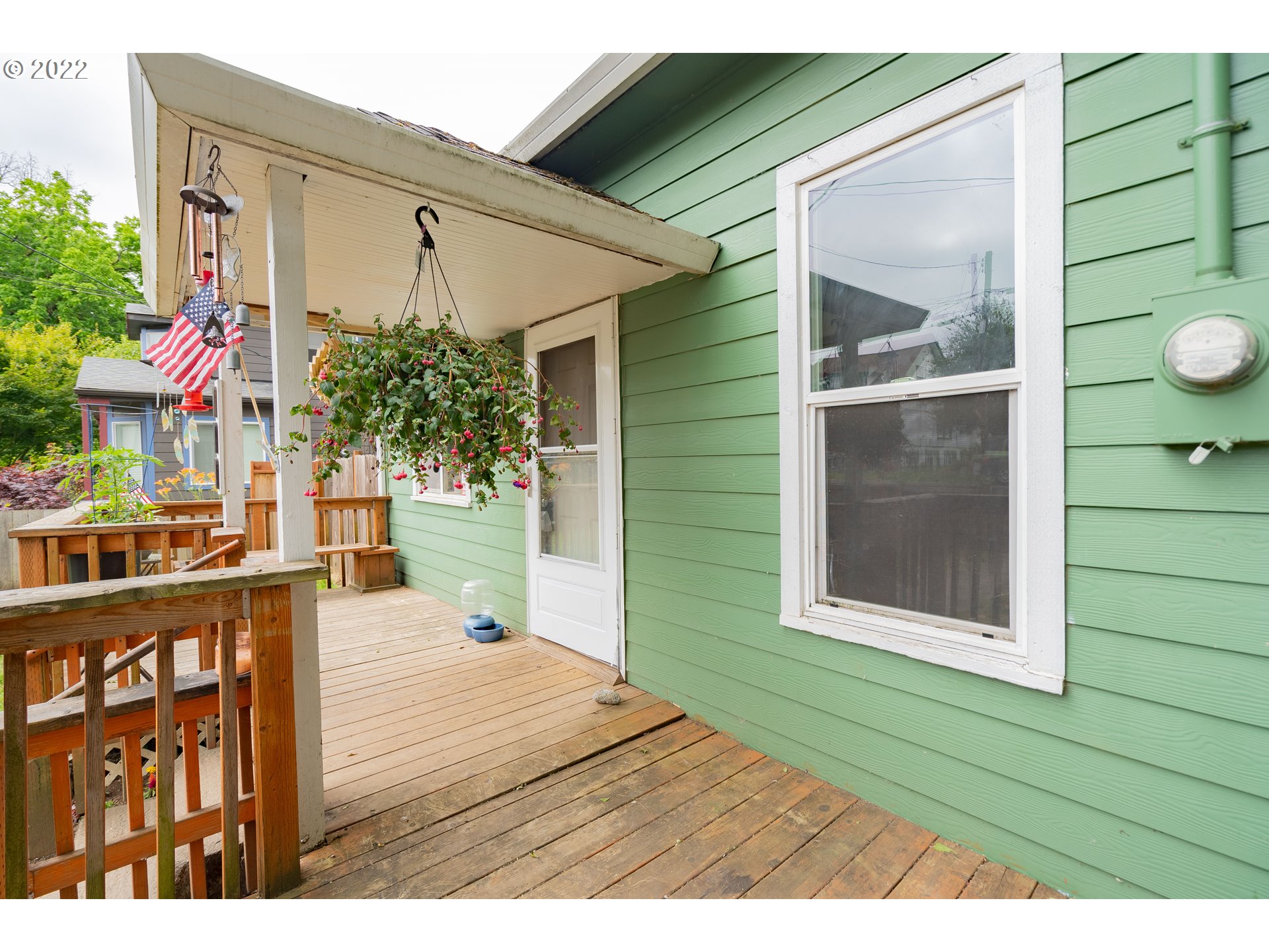 111 South 3rd Avenue Ridgefield, WA 98642 - Photo 6 of 32 a porch with seating space and yard
