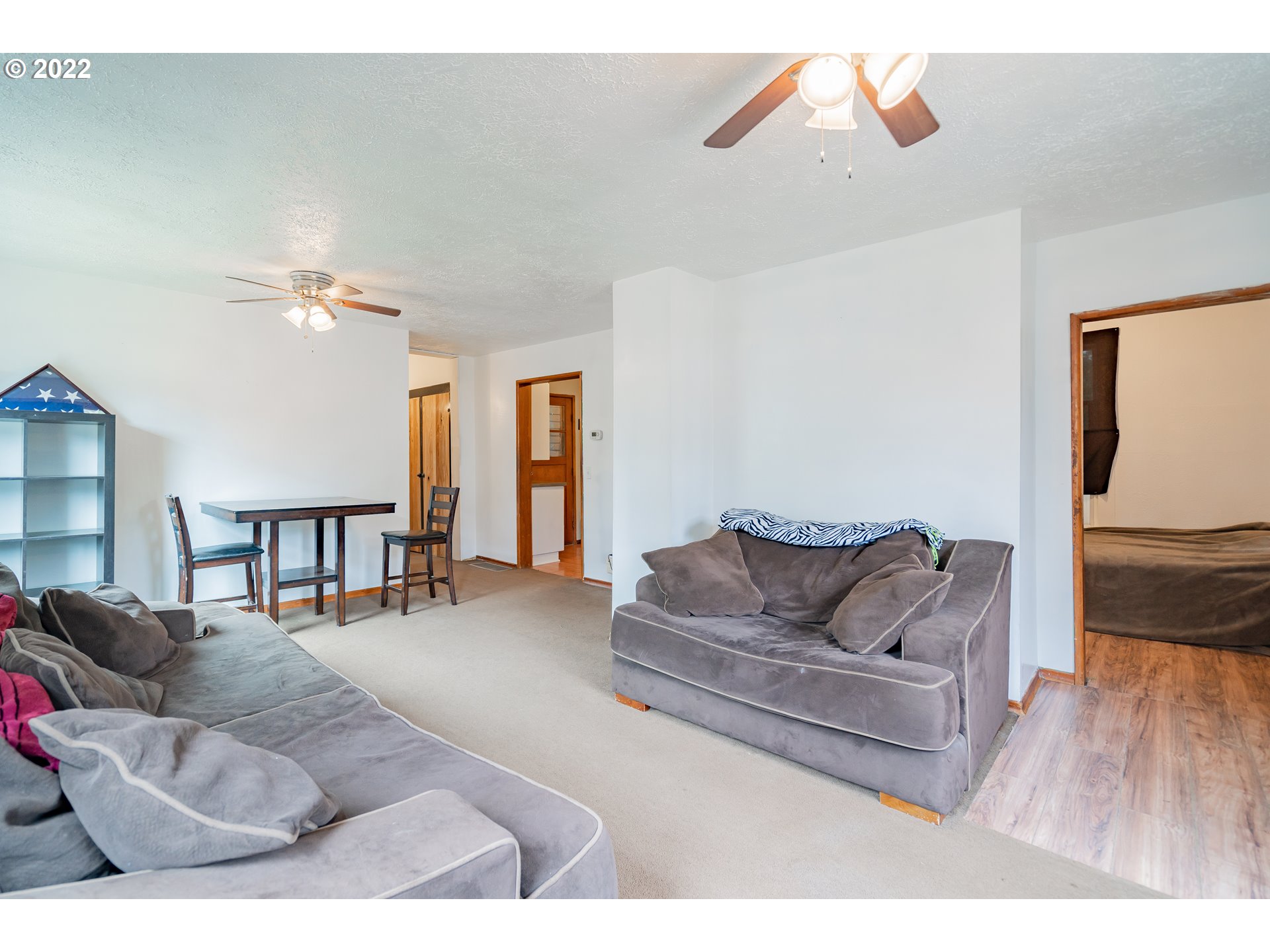 111 South 3rd Avenue Ridgefield, WA 98642 - Photo 9 of 32 a living room with furniture and a couch