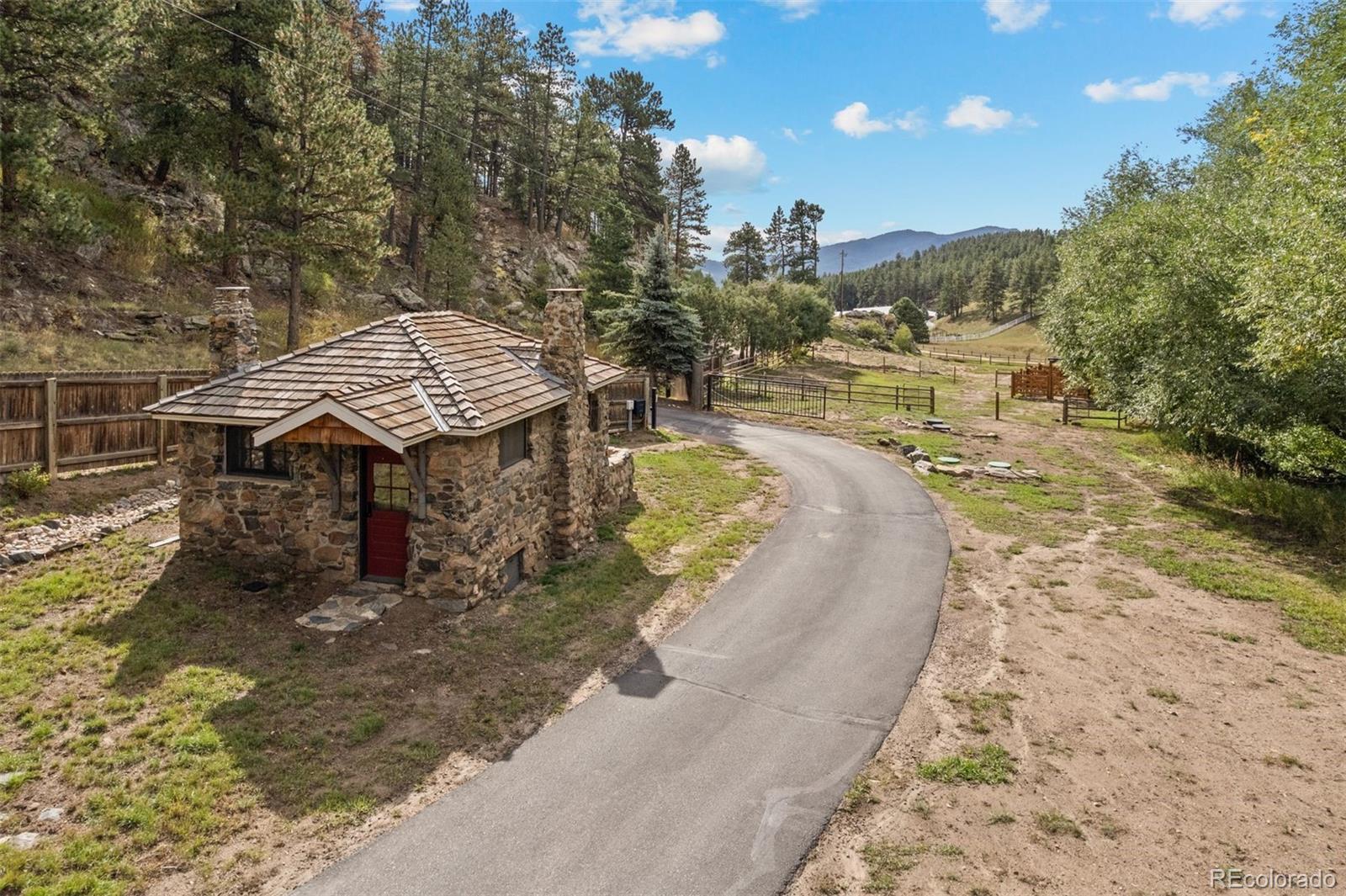 1733 Swede Gulch Road Evergreen, CO 80439 - Photo 47 of 50 swimming pool view with a sitting space