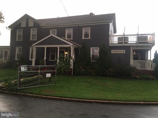 174 West Tomlin Station Road Mickleton, NJ 08056 - Photo 1 of 41 a front view of a house with a garden