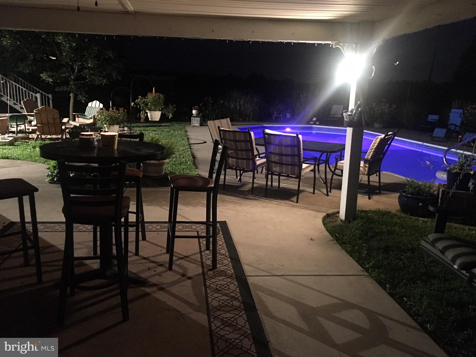 174 West Tomlin Station Road Mickleton, NJ 08056 - Photo 18 of 41 a view of a patio with table and chairs a barbeque