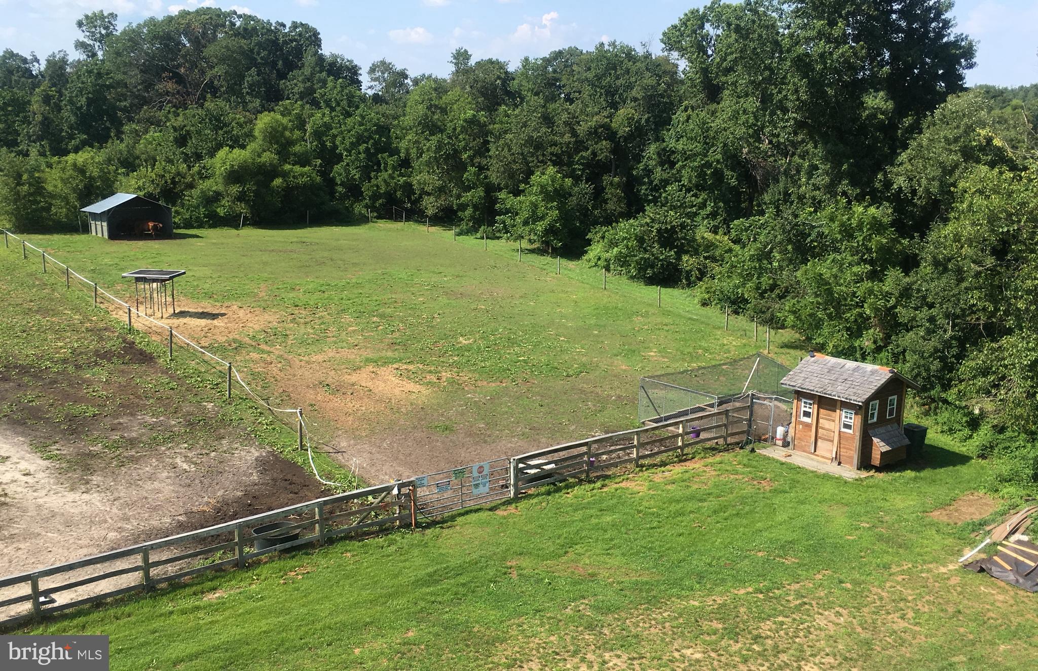 174 West Tomlin Station Road Mickleton, NJ 08056 - Photo 26 of 41 a view of a golf course with a garden