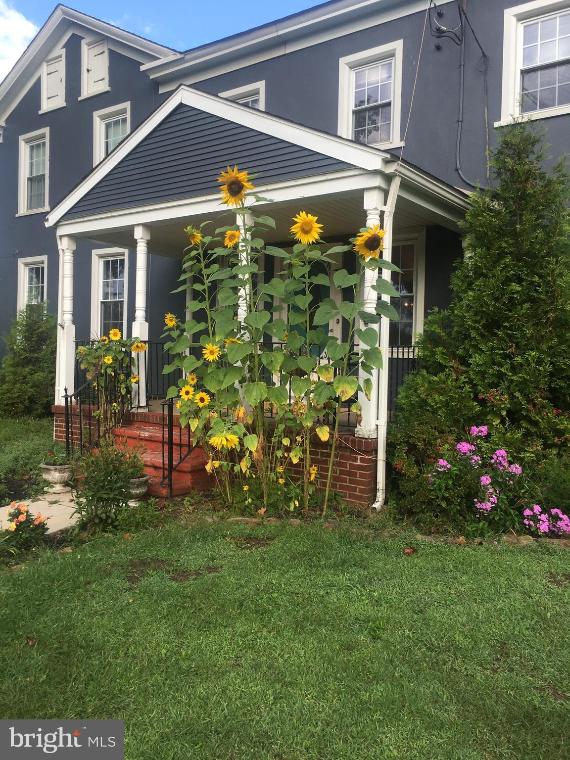174 West Tomlin Station Road Mickleton, NJ 08056 - Photo 7 of 41 a front view of a house with garden