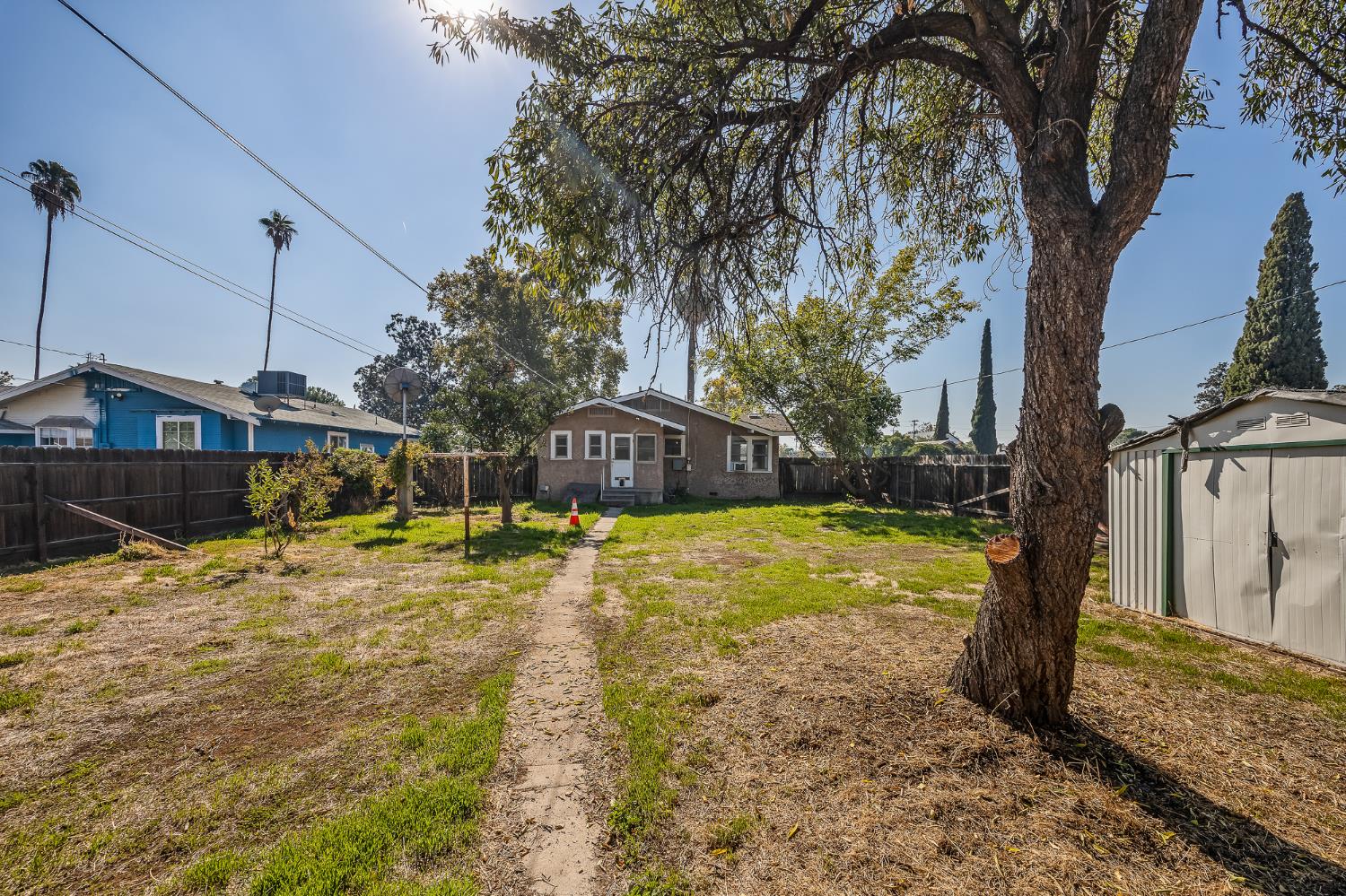 4001 East Balch Avenue Fresno, CA 93702 - Photo 18 of 22 a view of a house with yard and covered with snow