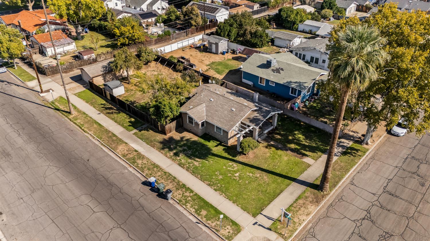 4001 East Balch Avenue Fresno, CA 93702 - Photo 2 of 22 an aerial view of residential houses with outdoor space