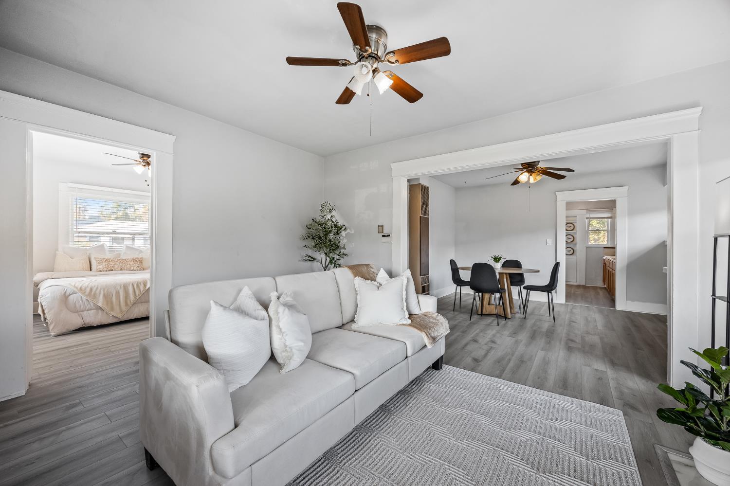 4001 East Balch Avenue Fresno, CA 93702 - Photo 4 of 22 a living room with furniture and a window